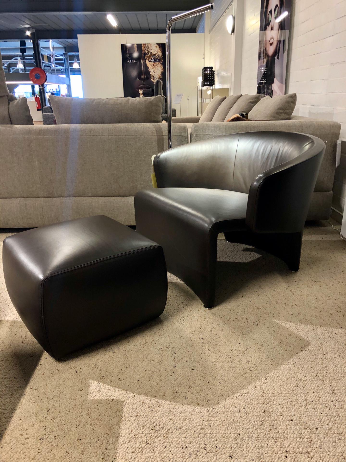 Minotti fauteuil + poef